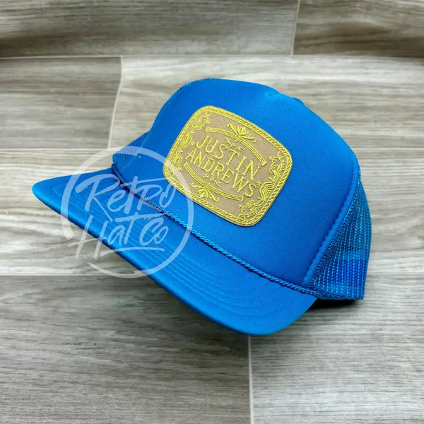 Justin Andrews Gold Buckle Patch On Turquoise Meshback Trucker Ready To Go