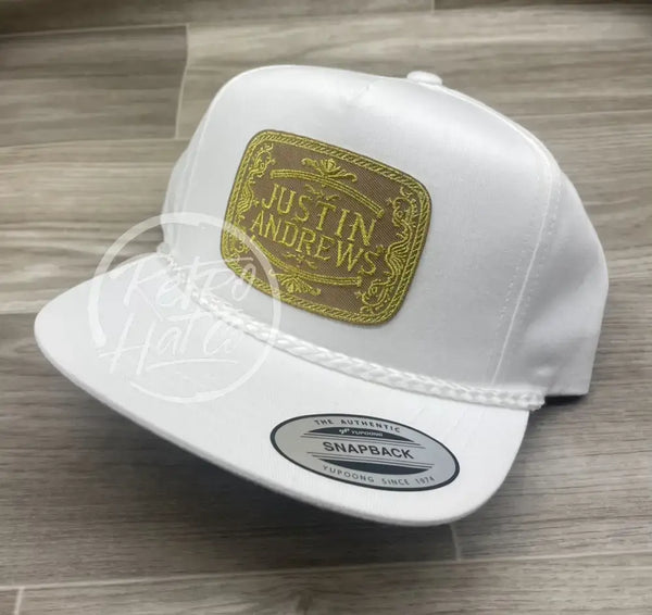 Justin Andrews Gold Buckle Patch On White Classic Rope Hat Ready To Go