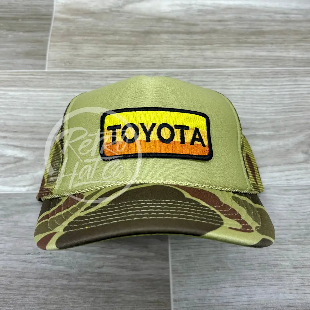 Retro Toyota Patch on Solid Front Camo Trucker Hat